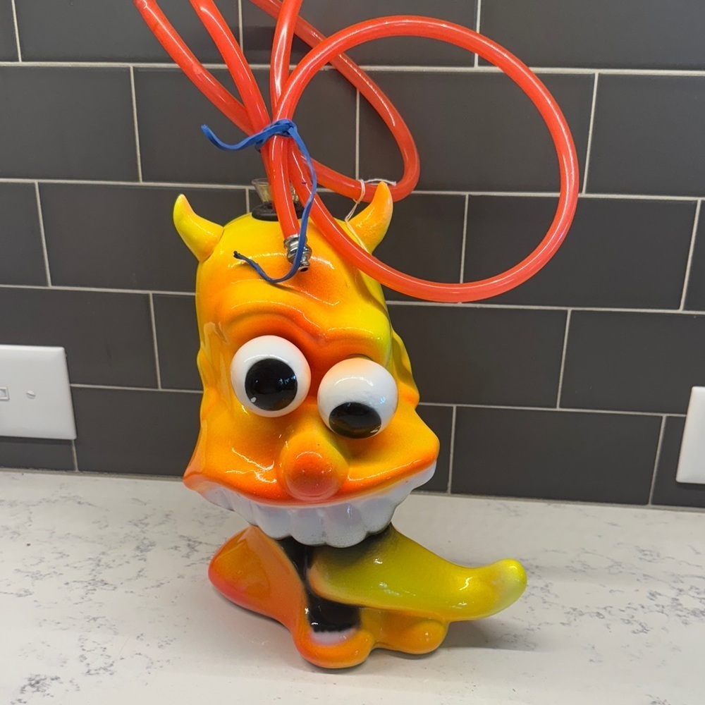 Hoka Vintage Orange and Yellow Devil Head Accent